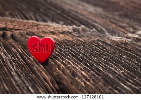 Love heart on break wood texture background, valentines day card concept