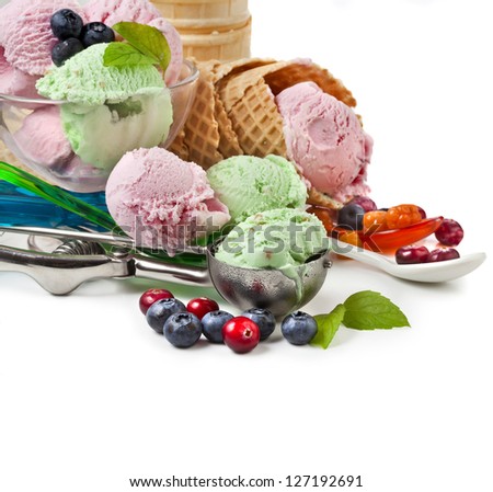 Mixed ice cream with fresh berries isolated on white
