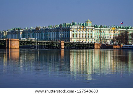View Winter Palace in Saint Petersburg with reflection from Neva river. Russia .