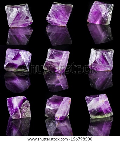 Collection of Fluorite Crystal Purple with reflection on black surface background