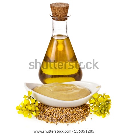 Mustard oil jar, powder sauce, seeds , fresh mustard flower  isolated on white background