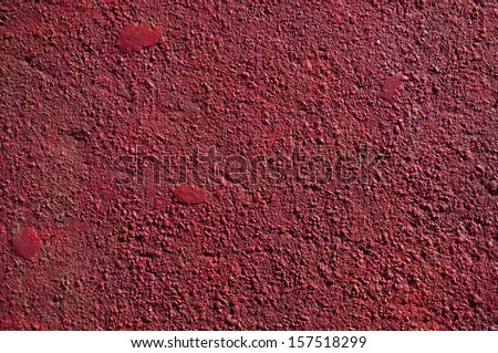 Red Colored concrete wall surface texture backdrop