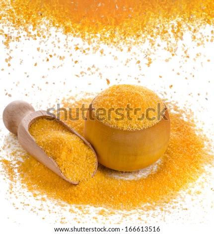 cornmeal maize flour in wooden bowl scoop dish isolated on white background