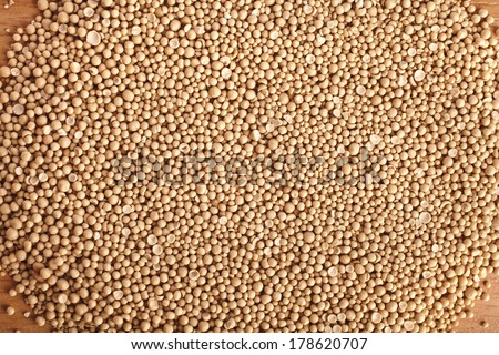 Dry yeast balls in wooden board table surface top view