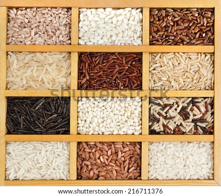 variety of rice grains (white, brown, black, wild, basmati, arborio, short, long grain) in vintage wooden case box