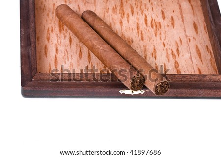 Two Cuban Cigars in the Box  in mahogany