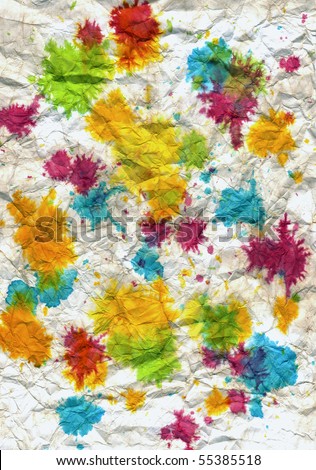 colored spots on the colorful crumpled paper