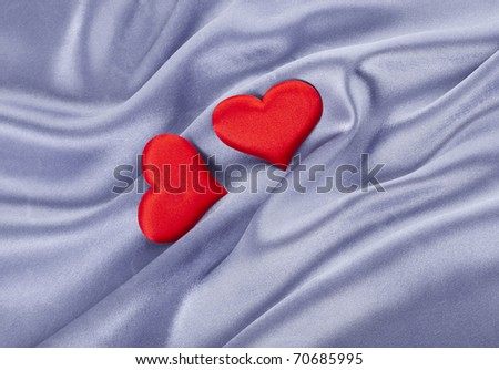 Beautiful Silk Background with red hearts