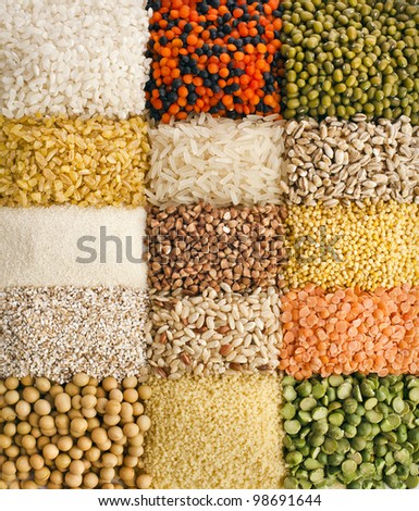 Variation of dry lentils, beans, peas, grain , groats,soybeans, legumes, surface  close up macro top view  backdrop