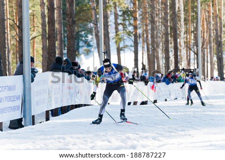 Tyumen, RUSSIA - APR 9, 2014: Martin Fourcade (FRA) at Biathlon Men\'s 18 km Mega Mass start at  International Biathlon Competition \