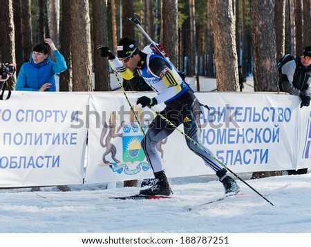 Tyumen, RUSSIA - APR 9, 2014: Martin Fourcade (FRA) at Biathlon Men's 18 km Mega Mass start at  International Biathlon Competition 