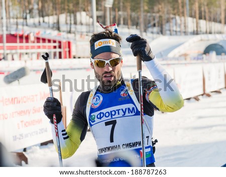 Tyumen, RUSSIA - APR 9, 2014: Simon Fourcade (FRA) after finish at Biathlon  Men\'s 18 km Mega Mass start at  International Biathlon Competition \