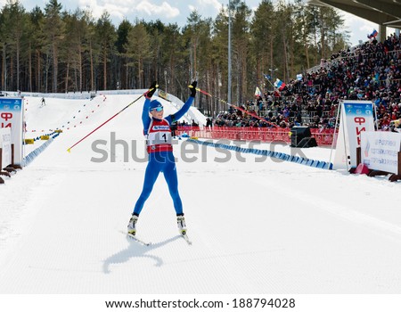 Tyumen, RUSSIA - APR 9, 2014: Kaisa MAKARAINEN (FIN) finishes at Biathlon Women\'s 13.5 km Mega Mass start at  International Biathlon Competition \
