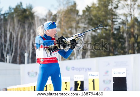 Tyumen, RUSSIA - APR 9, 2014: Kaisa MAKARAINEN (FIN) on a firing line at Biathlon Women\'s 13.5 km Mega Mass start at  International Biathlon Competition \