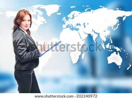 businesswoman   standing in front of an earth map
