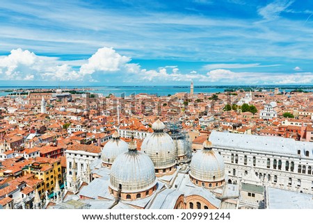 Beautiful views of the Mediterranean traditional houses Venice with red tile roofs from Campanile di San Marco. Venice, Italy, Europe