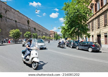 ROME, ITALY - JULY 15, 2014: street in Rome along the walls of the Vatican.Rome is the capital of Italy and also of the homonymous province and of the region of Lazio.