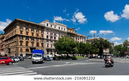 ROME, ITALY -JULY 15, 2014: People and cars on the street in Rome, Italy. According to Euromonitor, Rome is the 3rd most visited city in Europe