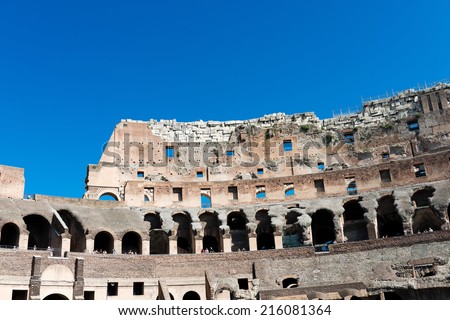 ROME, ITALY - JULY 16, 2014: inside of Colosseum in Rome, Italy. The Colosseum is an important monument of antiquity and is one of the main tourist attractions of Rome.