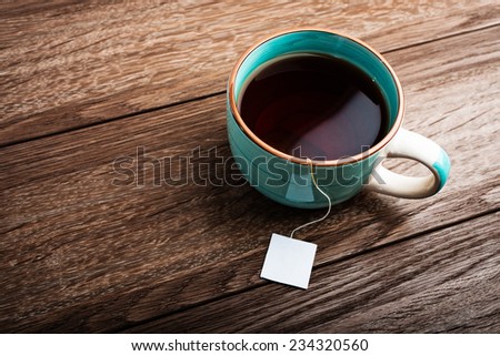 Blue mug on wooden table