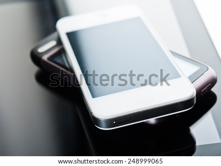 two phones on tablet pc