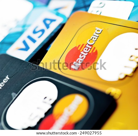 YEKATAERINBURG, RUSSIA - JAN 07, 2015: Pile of credit cards, Visa and MasterCard. Visa and Mastercard are a two biggest credit card companies in the world.