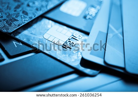 E-commerce concept. group of credit cards and laptop with shallow DOF