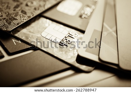E-commerce concept. group of credit cards and laptop with shallow DOF