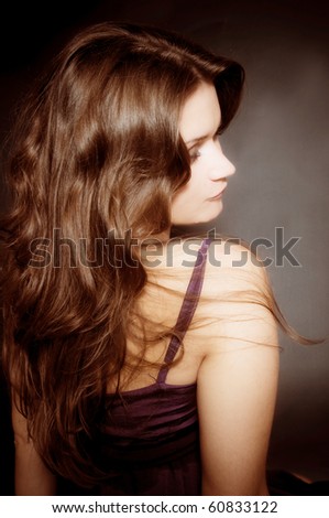 Beautiful female curly long hairs - back view
