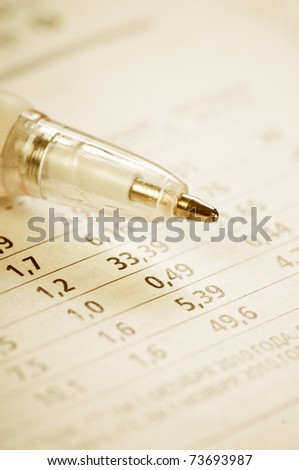 Close up of financial figures and pen
