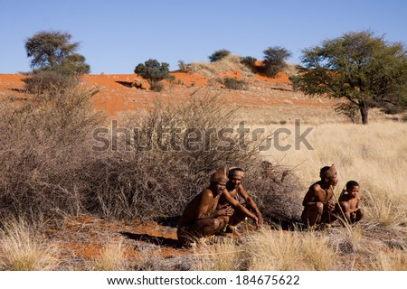 MARIENTAL, NAMIBIA - AUGUST 19: san bushman hunters show people how they hunt in the kalahari desert in Namibia august 19, 2013 in Mariental, Namibia