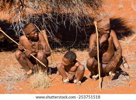 MARIENTAL, NAMIBIA - AUGUST 19: san bushmen family show people how they live in the kalahari desert in Namibia august 19, 2013 in Mariental, Namibia