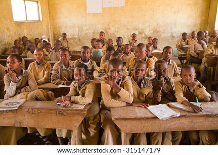 ARUSHA, TANZANIA - AUGUST 18: oldonyo masai school, more than 100 children attend school room they need funds and teachers for a proper teaching August 18, 2015 in Arusha, Tanzania
