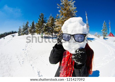 Happy young woman funny portrait in beautiful mountain landscape taken in polish Beskidy mountain during sunny day.