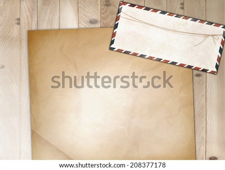 blank old nostalgic letters, post with envelope on wooden background