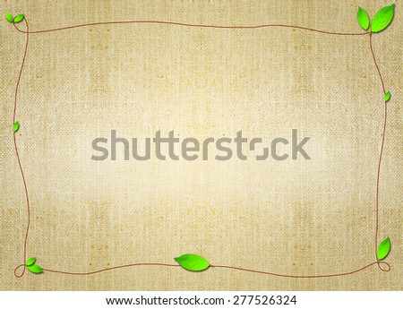 green leaf border flora frame over brown grungy parchment canvas background. Backdrop, invitation card design idea template wallpaper. Decoration, ornament, layout, artistic design.