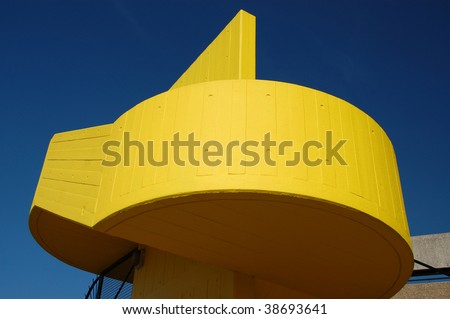 Painted yellow concrete spiral staircase on the Southbank of the River Thames, London England