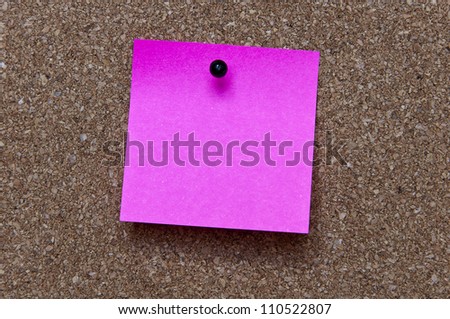 bulletin board and pink sheet for notes