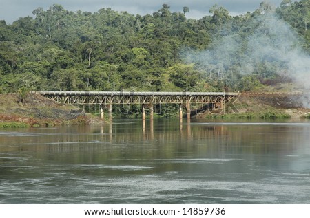 Railway bridge over the water near the power station in Brokopondo, Suriname