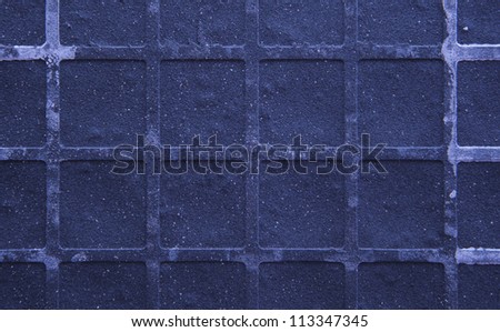 Seamless tileable grunge blue purple square marble stone background.