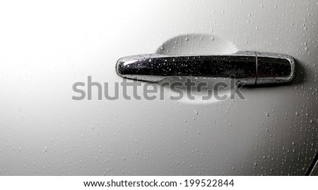Rain on White Car Door