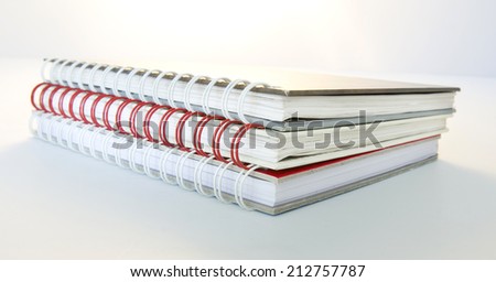 Three Diary Books on White background