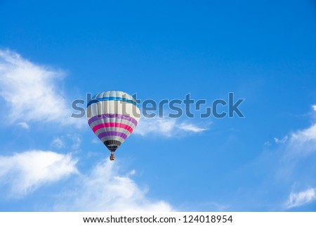 Hot Air Balloon. Hot Air Balloon on blue and cloudy sky