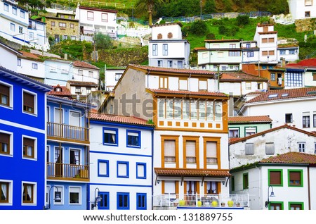 Colorful houses. Colorful windows and facades in Cudillero, Spain. Ancient facades