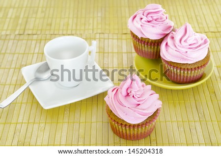 Cupcake. Pink tasty cupcake, isolated on white. Colorful Cup Cake on White Background