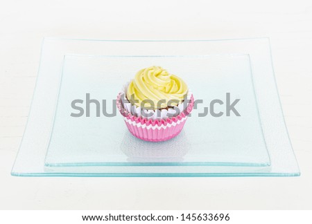 Cupcake. Pink tasty cupcake, isolated on white. Colorful Cup Cake on White Background