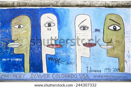 BERLIN - NOVEMBER 11: Fragment of East Side Gallery on November 11,2014 in Berlin. It\'s a 1.3 km long part of original Berlin Wall which collapsed in 1989 and now is the largest world graffiti gallery