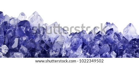 macro photo of blue sapphire crystals isolated on white background