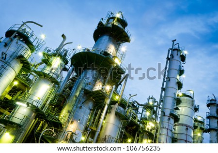 Column Tower In Petrochemical Plant At Twilight