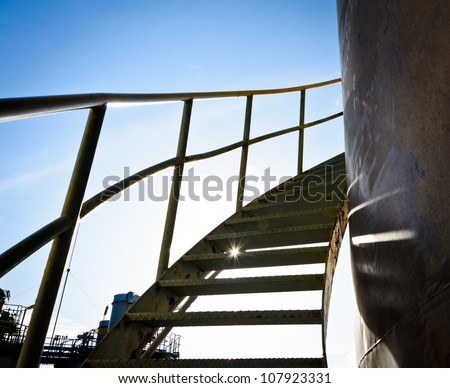 steel spiral up stairs on storage tank